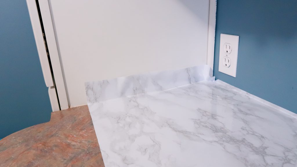 DIY Marble Countertops With Contact Paper via SlayAtHomeMother.com #contactpaper #diy #diycountertops #contactpapercounters #slayathomemother