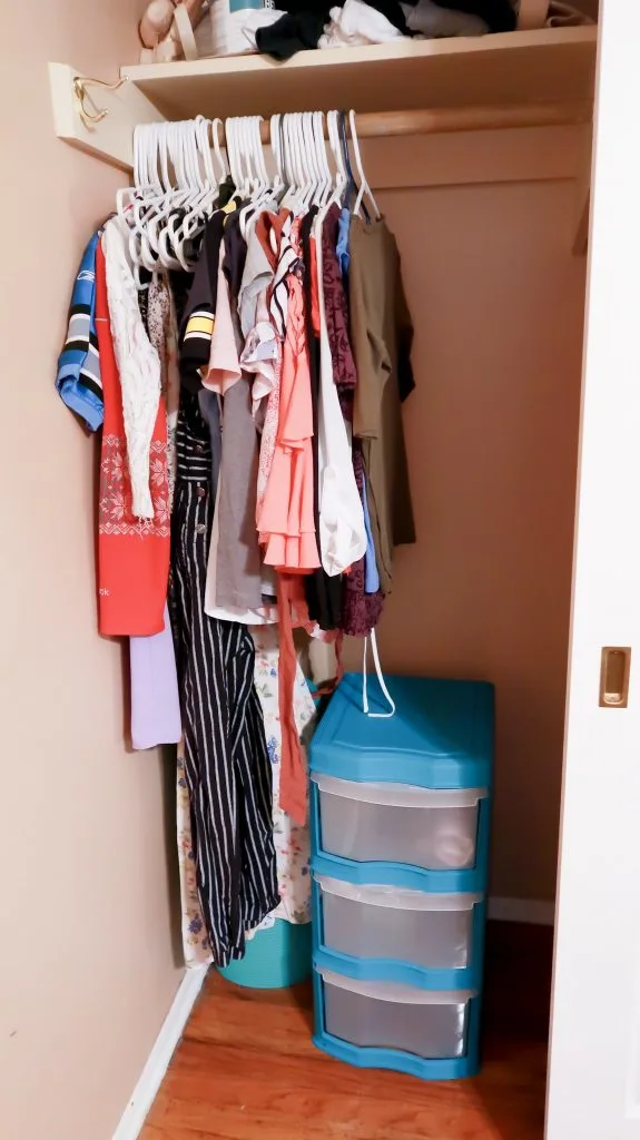 left side of master bedroom closet after purging and organizing