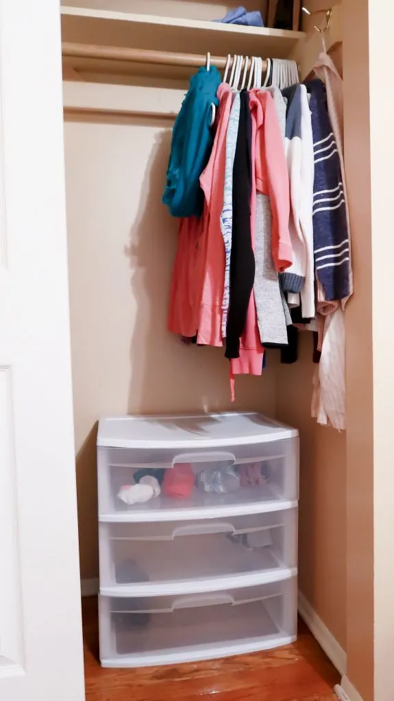 organized master bedroom closet after konmari purging