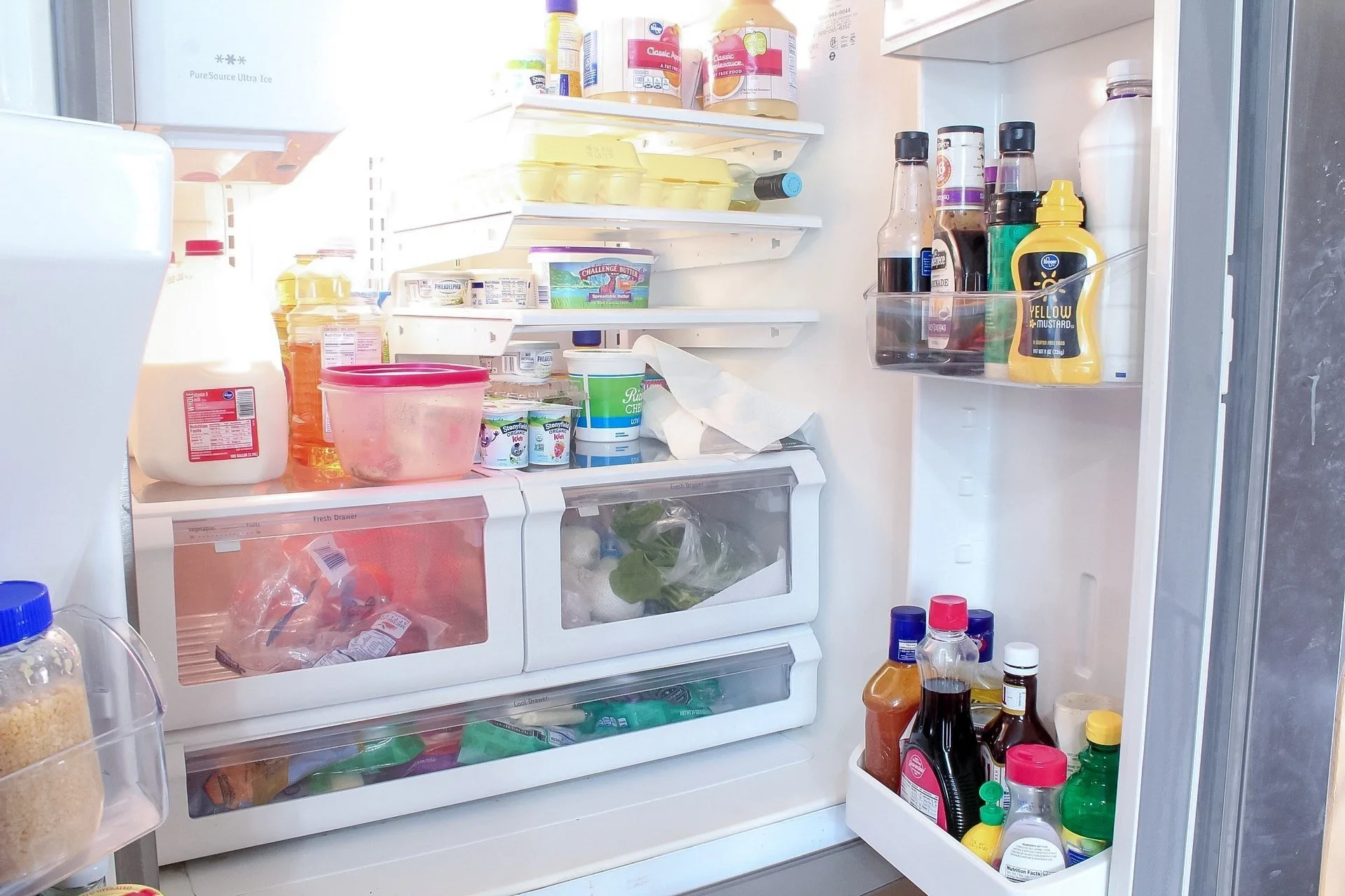 The inside of my fridge before cleaning and organizing it - it's very disorganized!