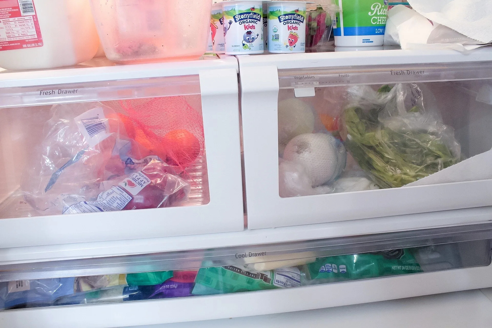 My produce drawers with old food, looking really messy.