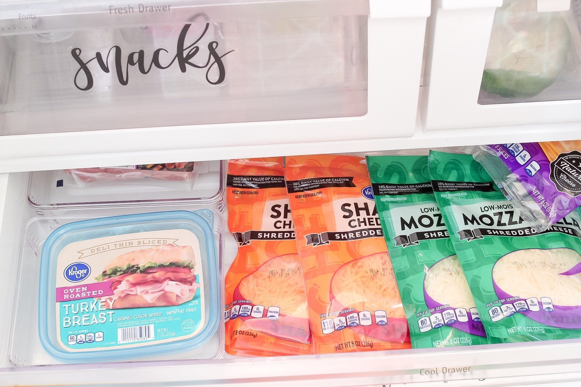 Deli meats and cheese storage in our organized fridge