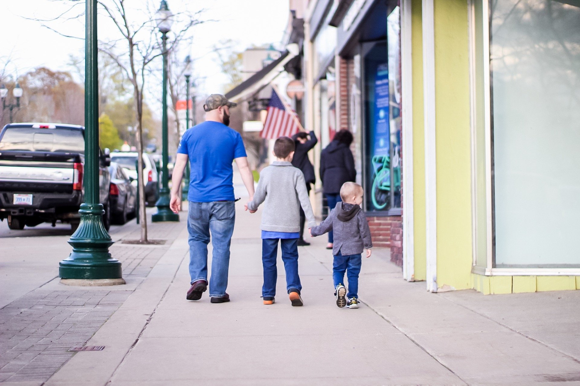 boys walking downtown petoskey, michigan