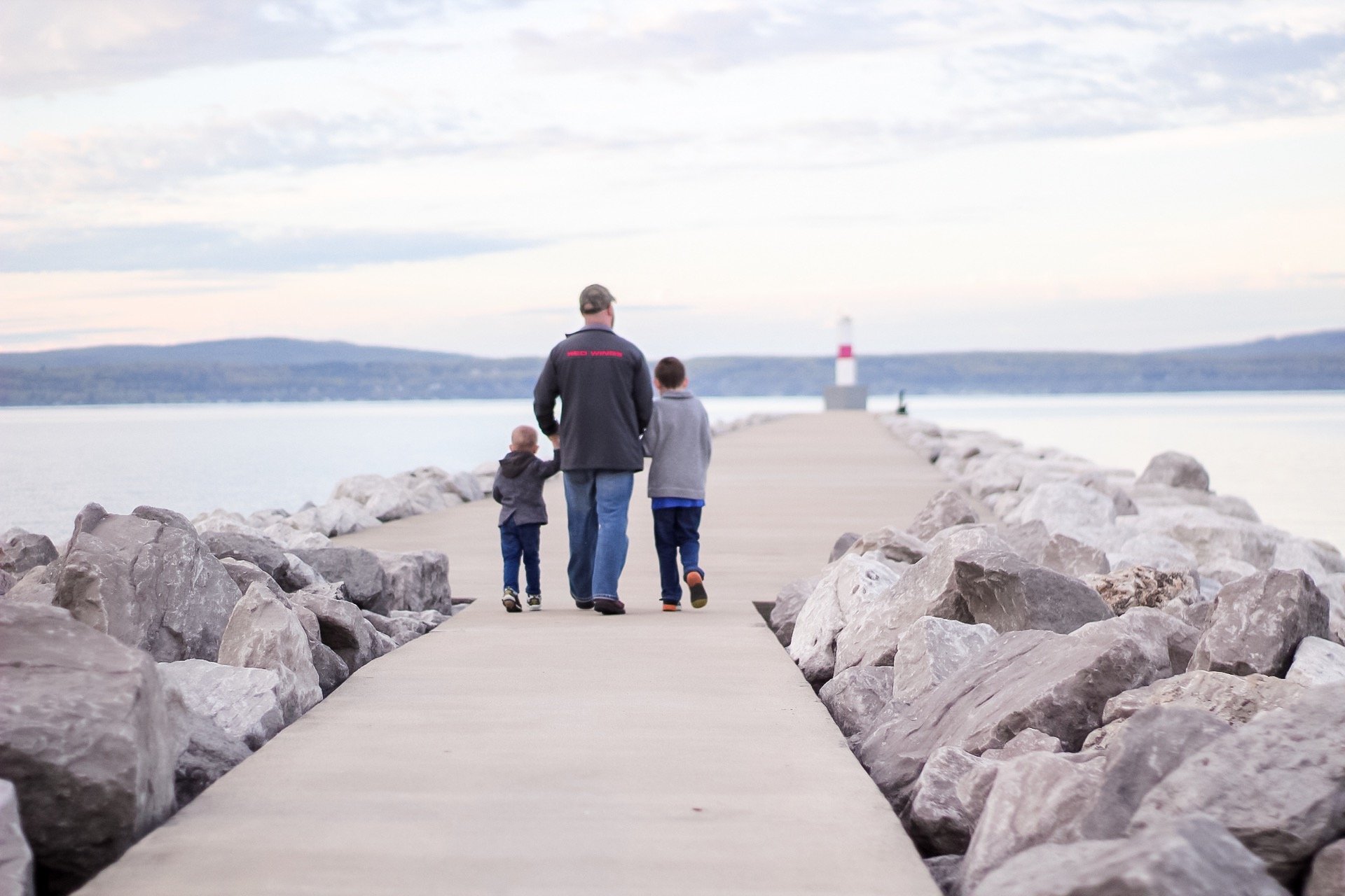 family walking the pier in petoskey mi