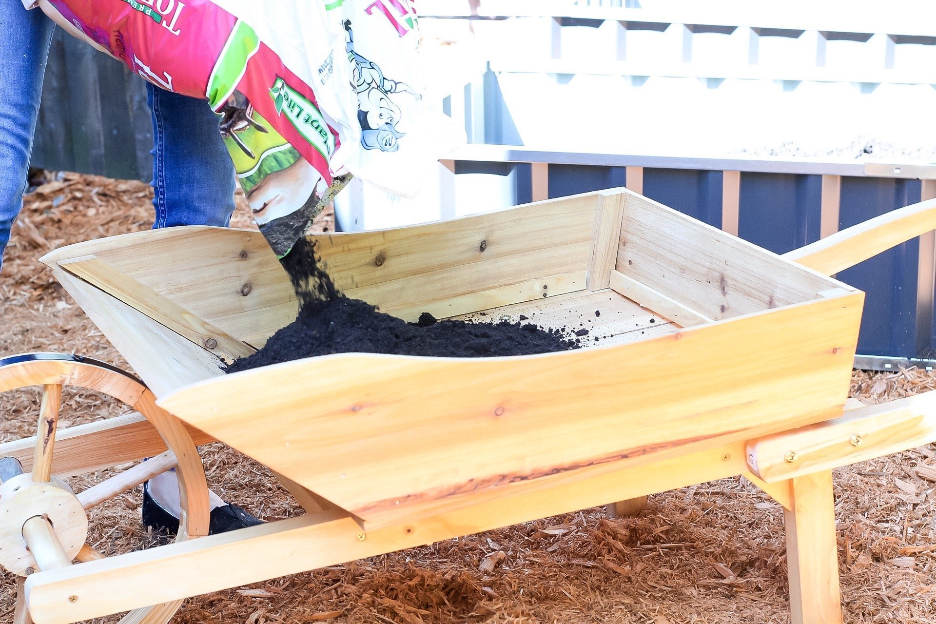 gardening tips - flling up the wheelbarrow