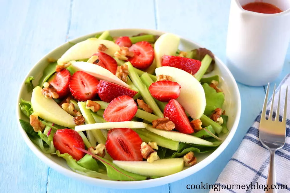 summer salad recipe with strawberries, apples, and rhubarb