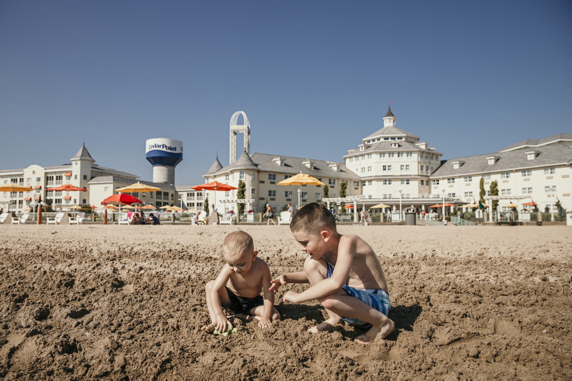 playing in the sand at hotel breakers in cedar point