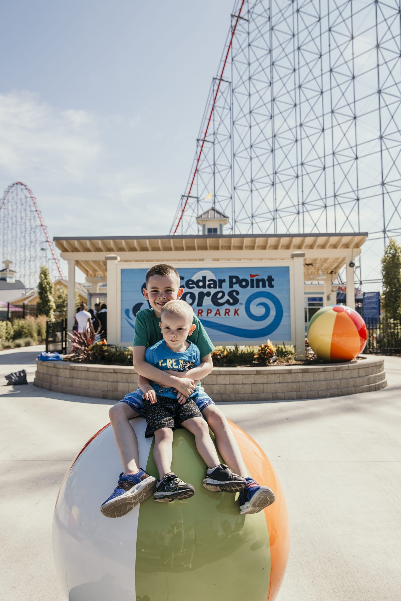 the boys in front of cedar point shores sign