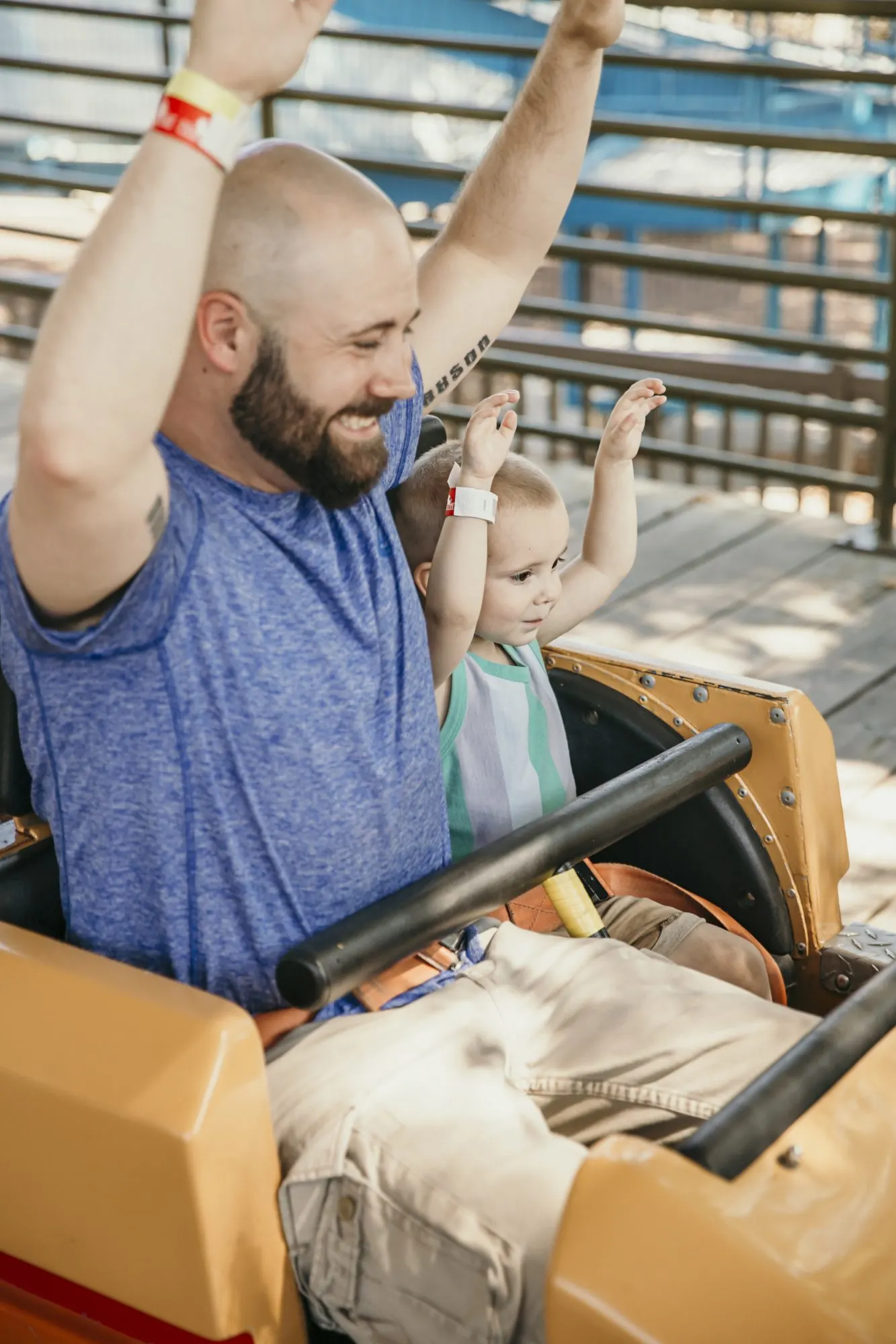 chris and jax riding their first roller coaster together