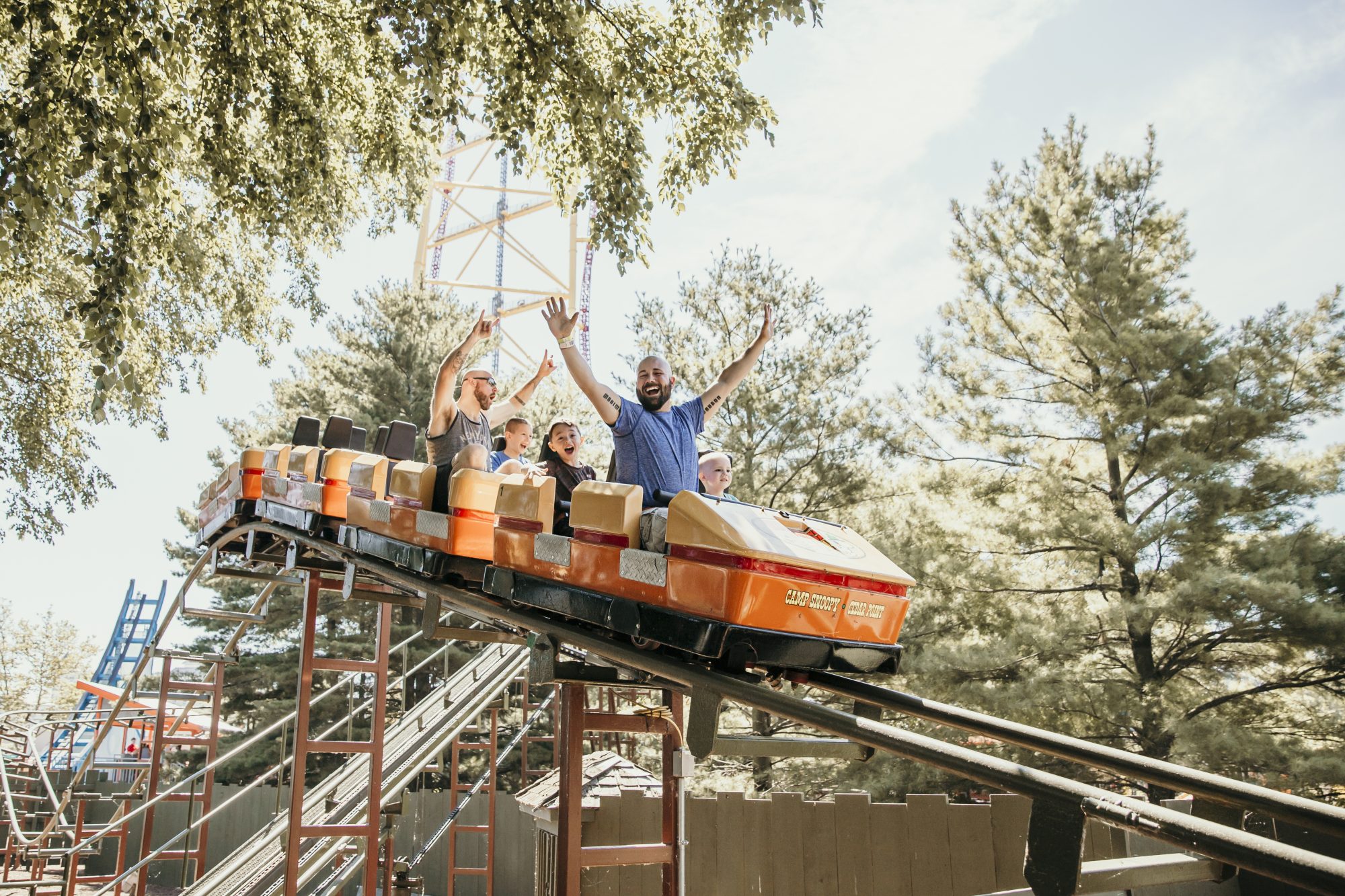 riding a roller coaster together