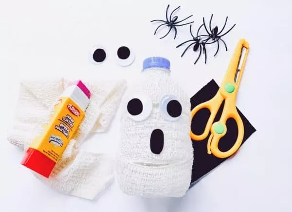 Halloween treats for kids - mummy water bottles with googly eyes
