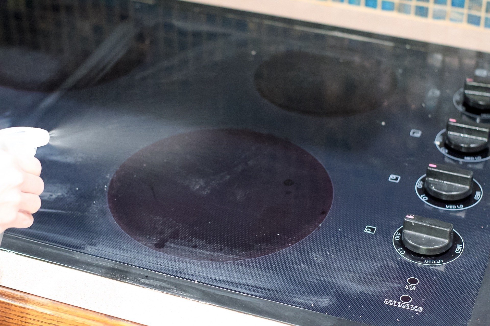 how to clean a black stove top