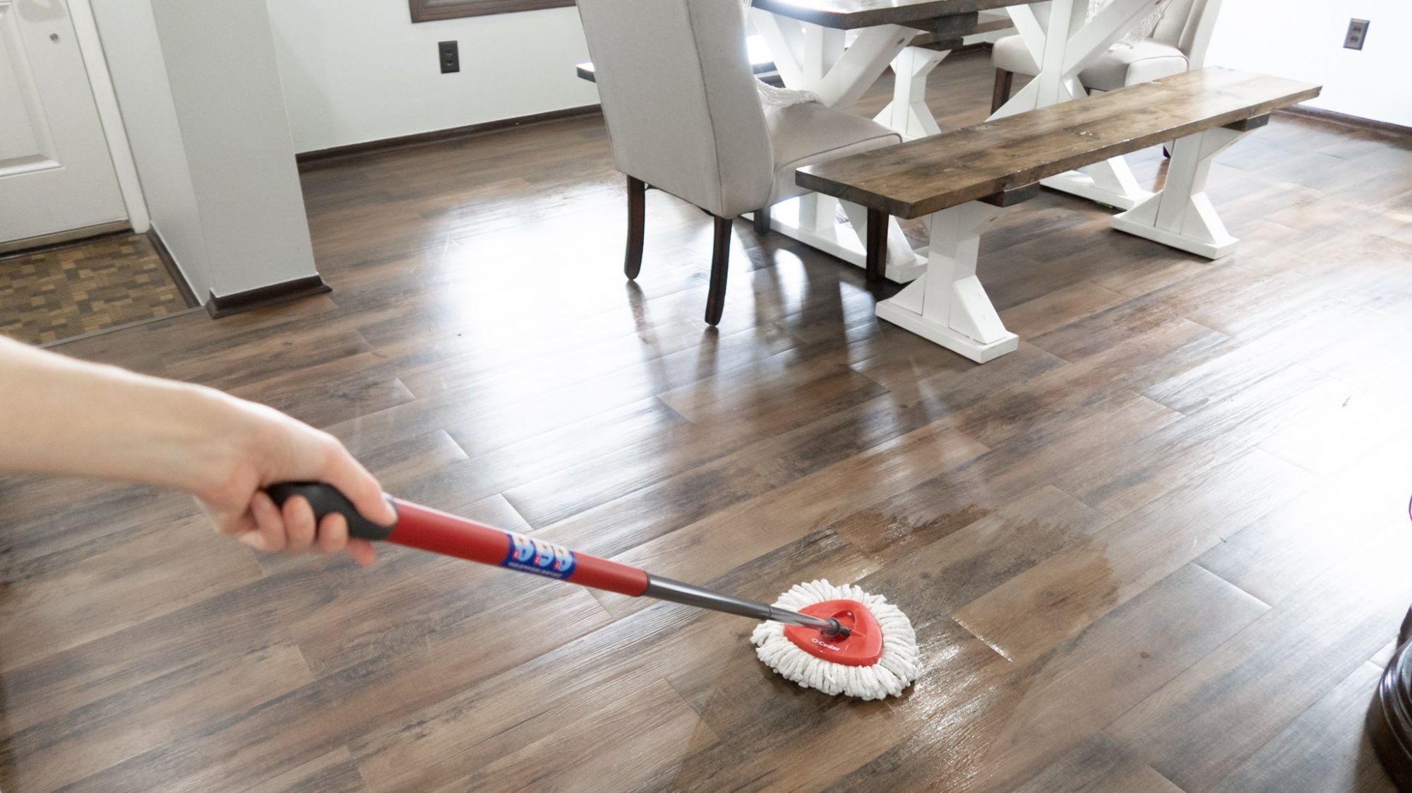 https://www.slayathomemother.com/wp-content/uploads/2019/08/mopping-with-Homemade-Floor-Cleaner-2000x1123.jpg