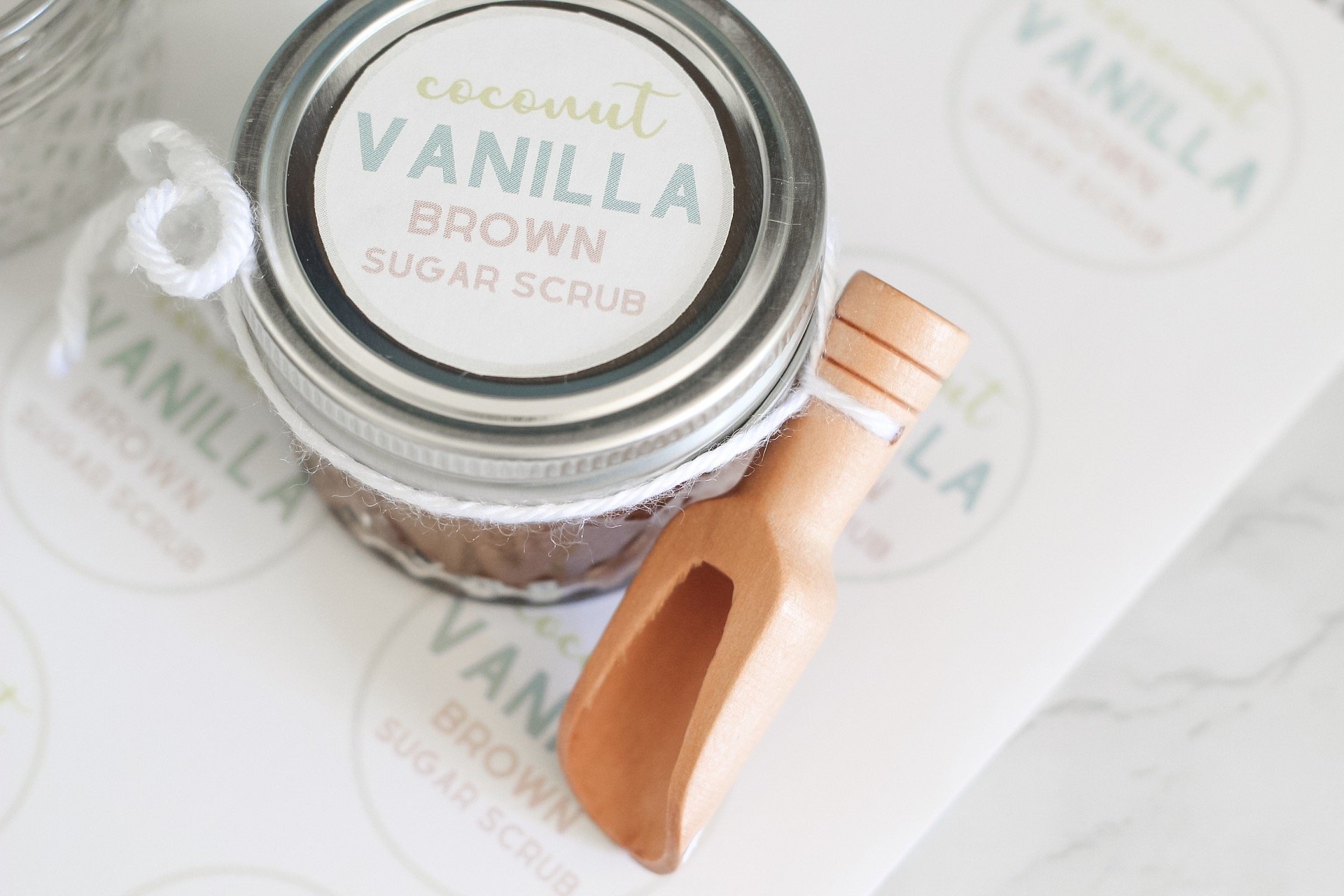 homemade sugar scrub with scoop and label