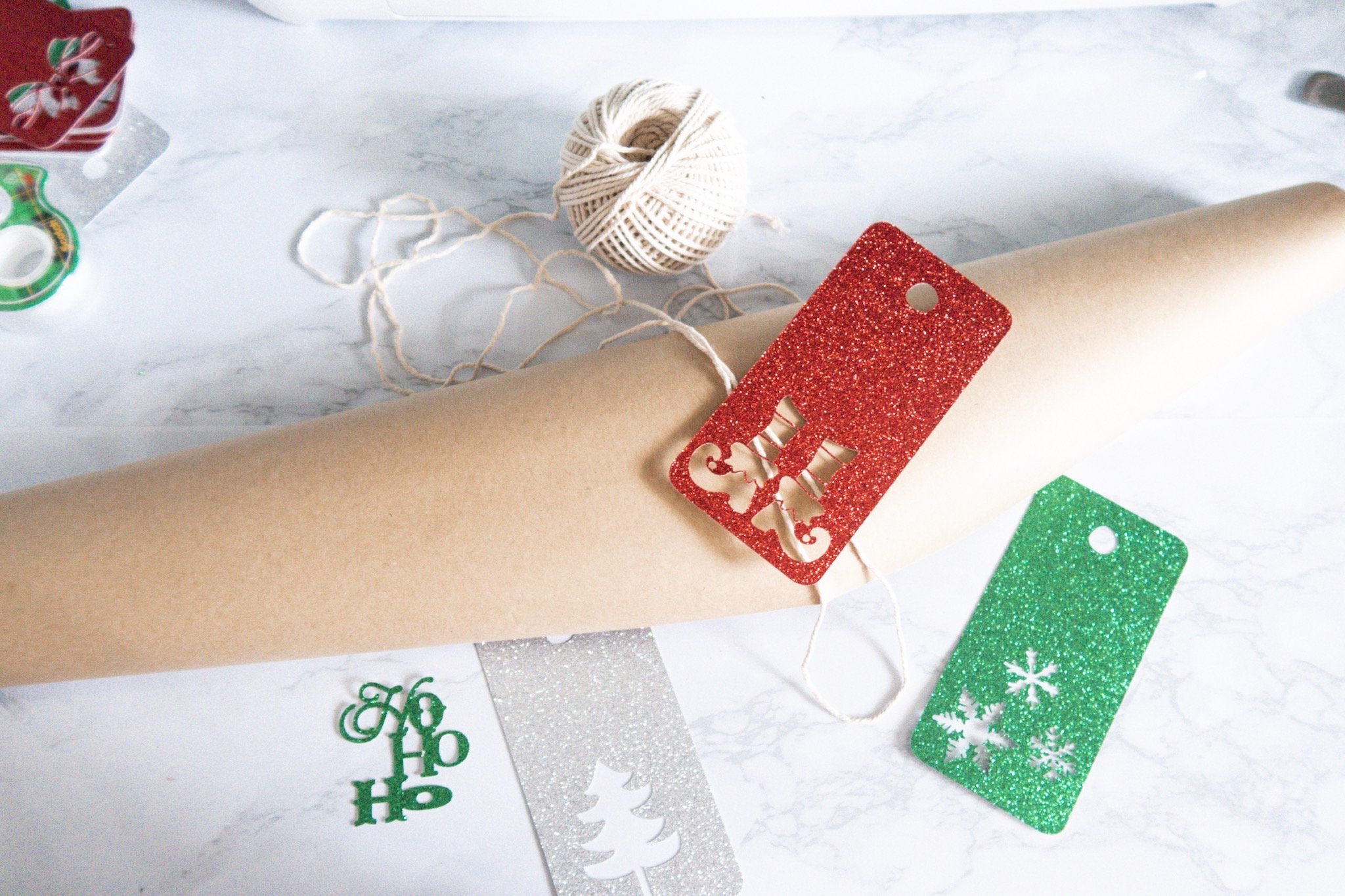 christmas gift tags wrapping paper and string