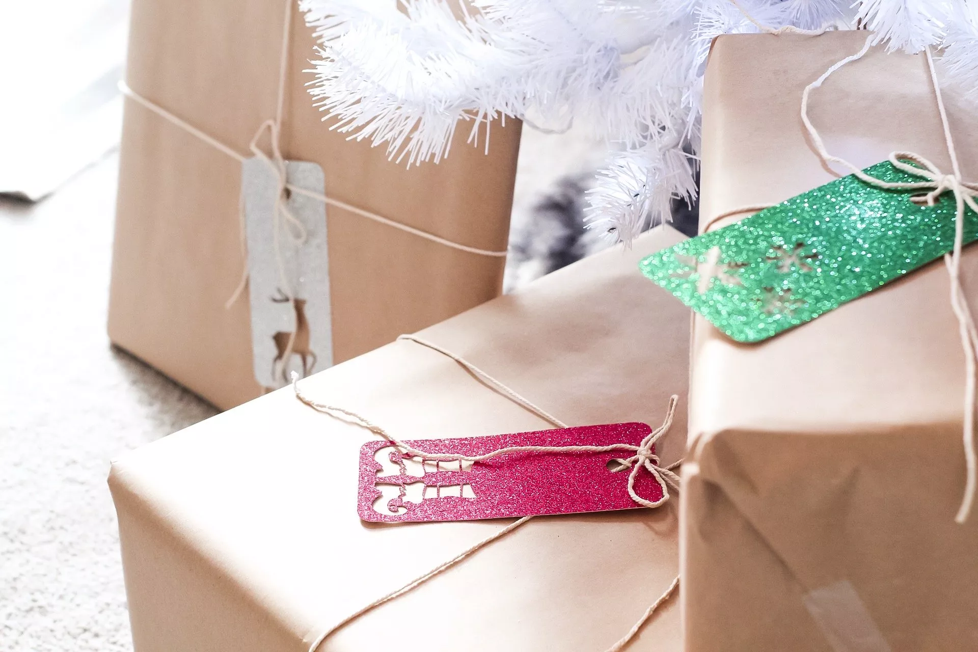closeup of diy glitter christmas gift tags