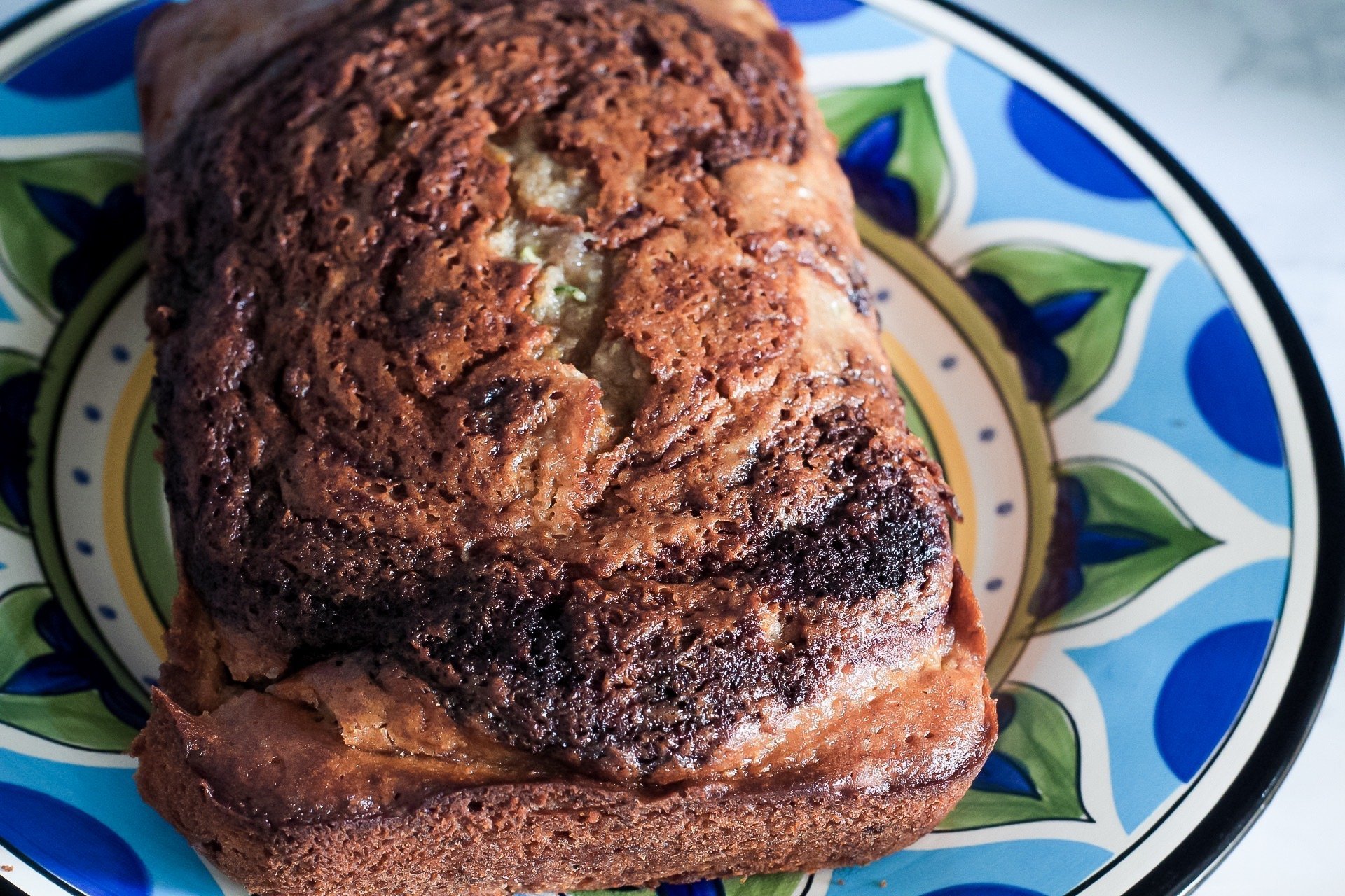 plated closeup sweet zucchini banana bread loaf