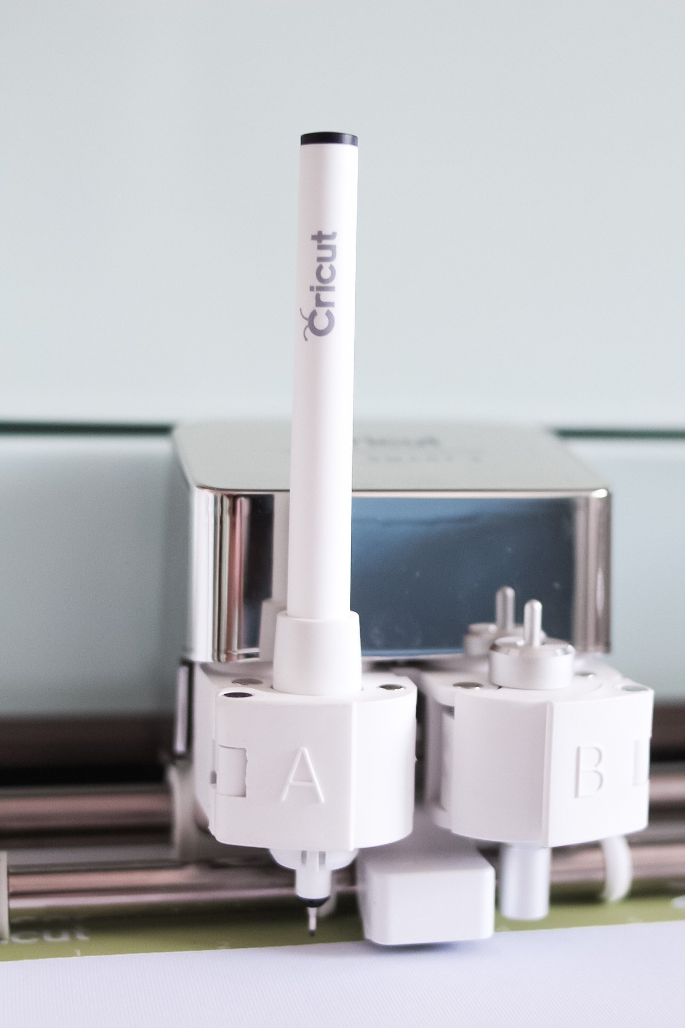 drawing pen loaded into clamp a of cricut machine