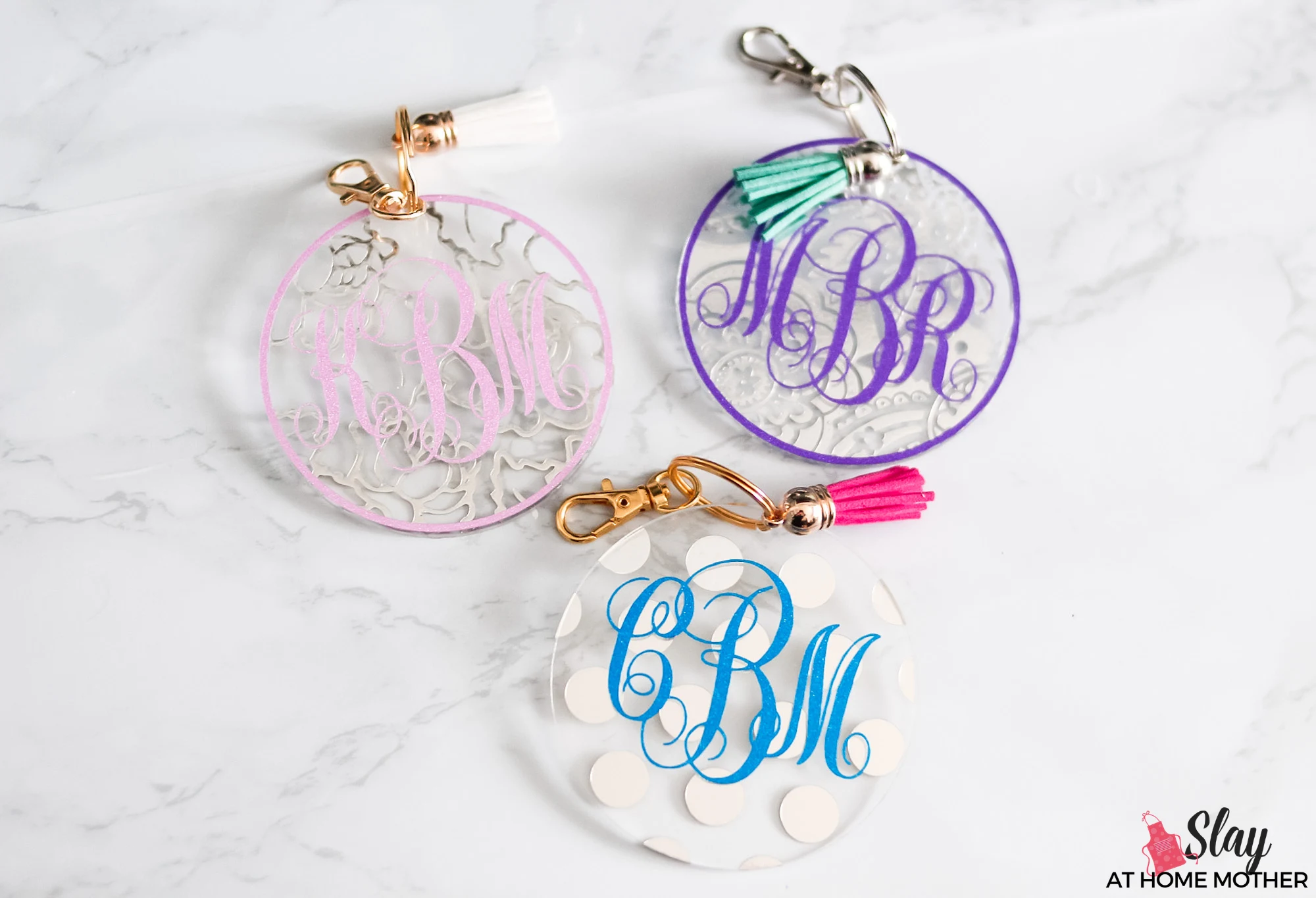 finished monogram keychains with silver and gold hardware and tassels