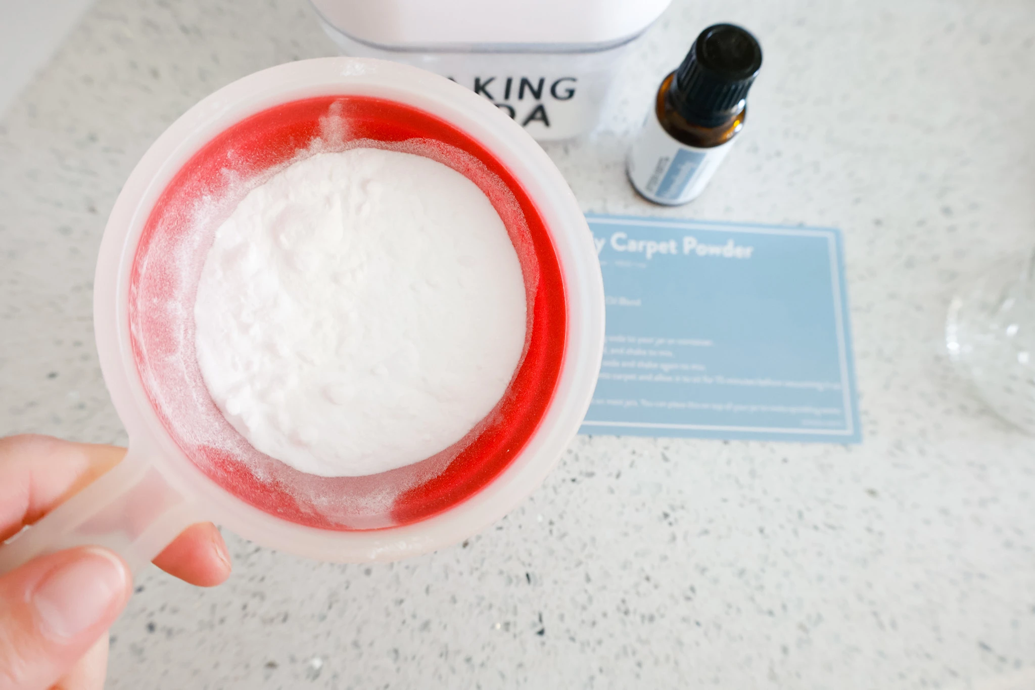 baking soda in measuring cup for carpet powder recipe