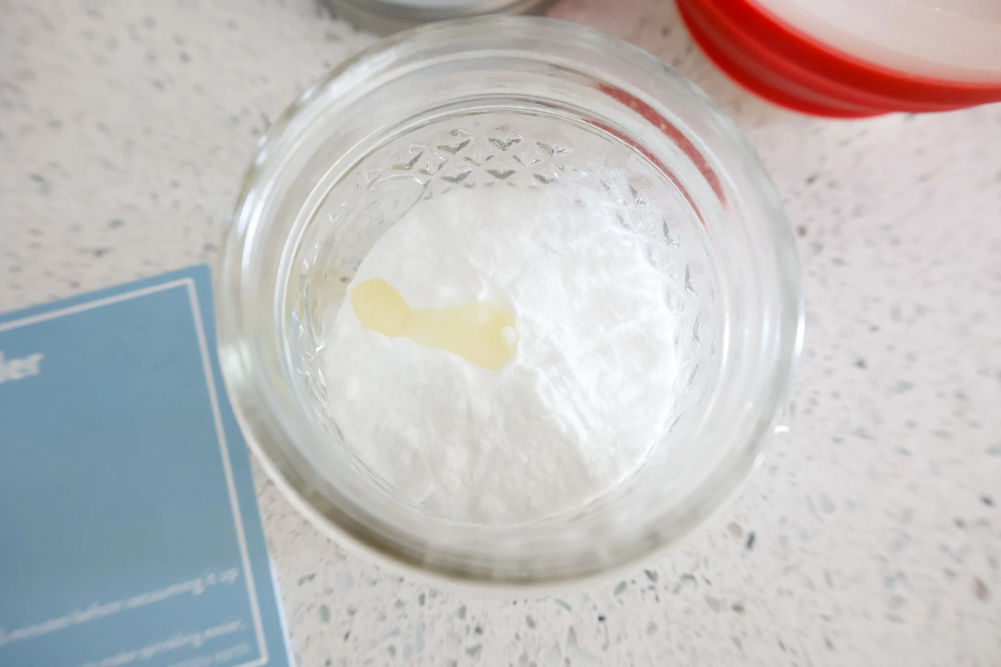 homebody oil blend and baking soda in jar - prior to shaking to combine