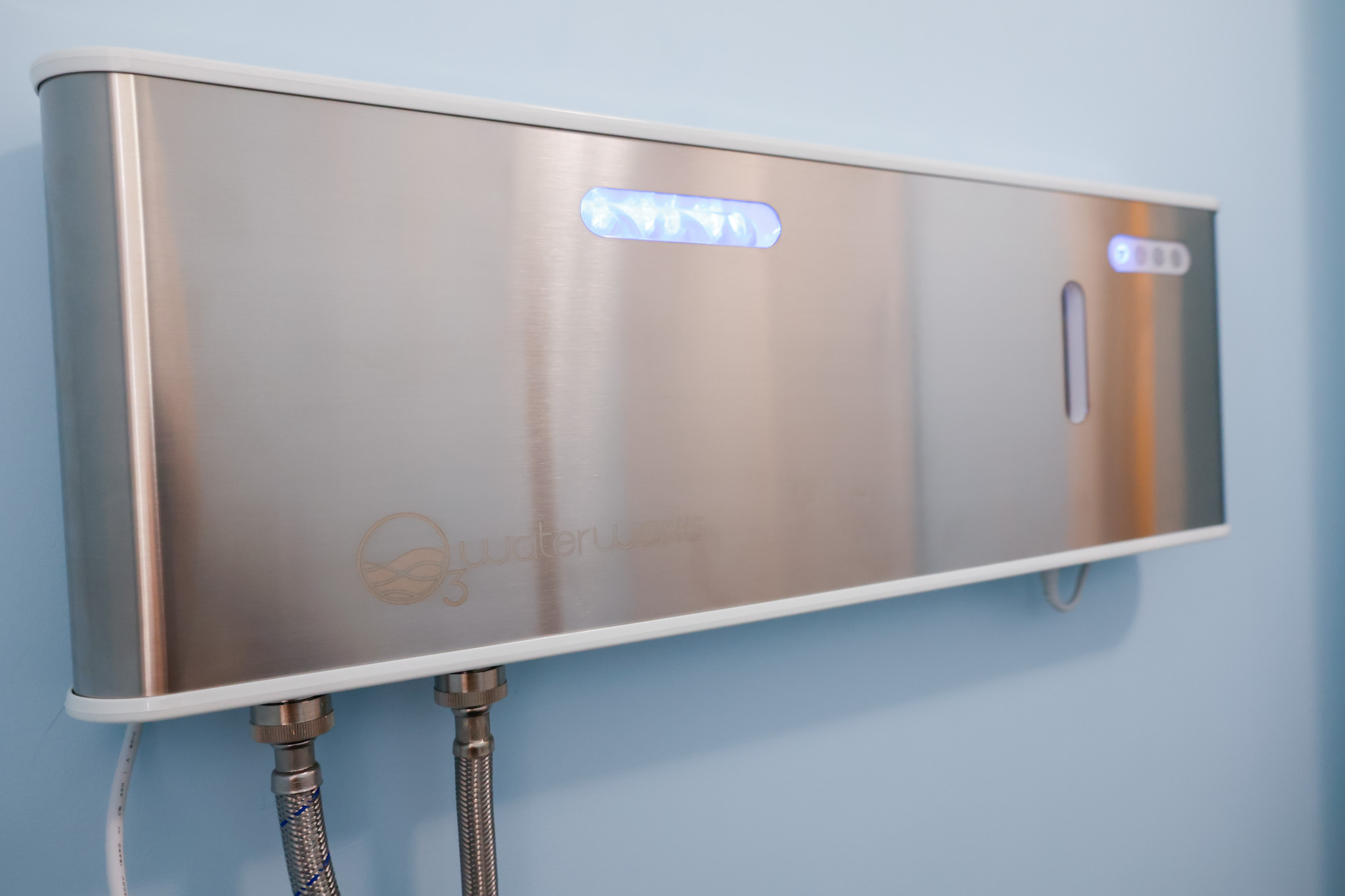 o3 waterworks laundry system installed on wall