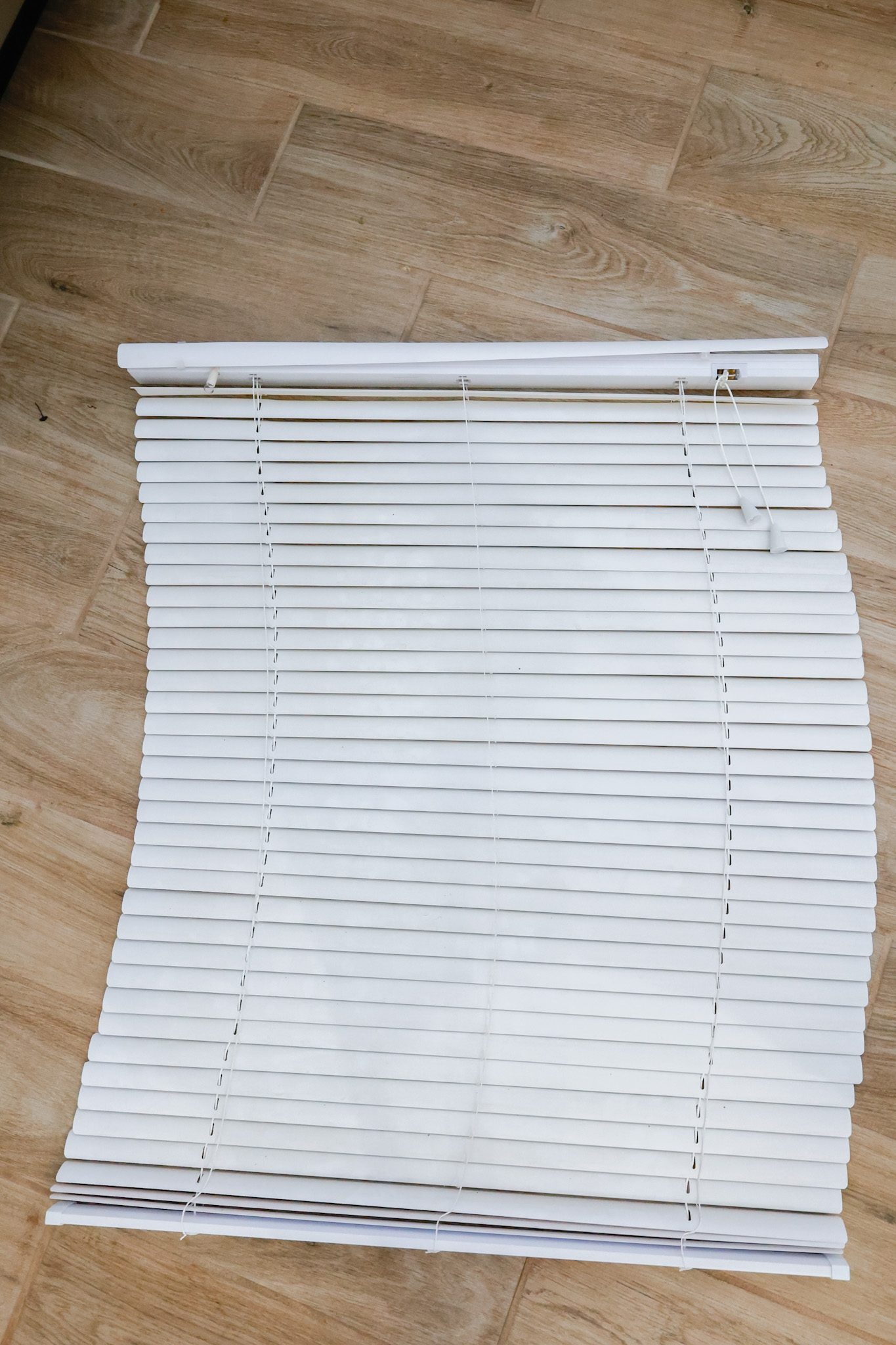full frame picture of dirty mini blinds before cleaning