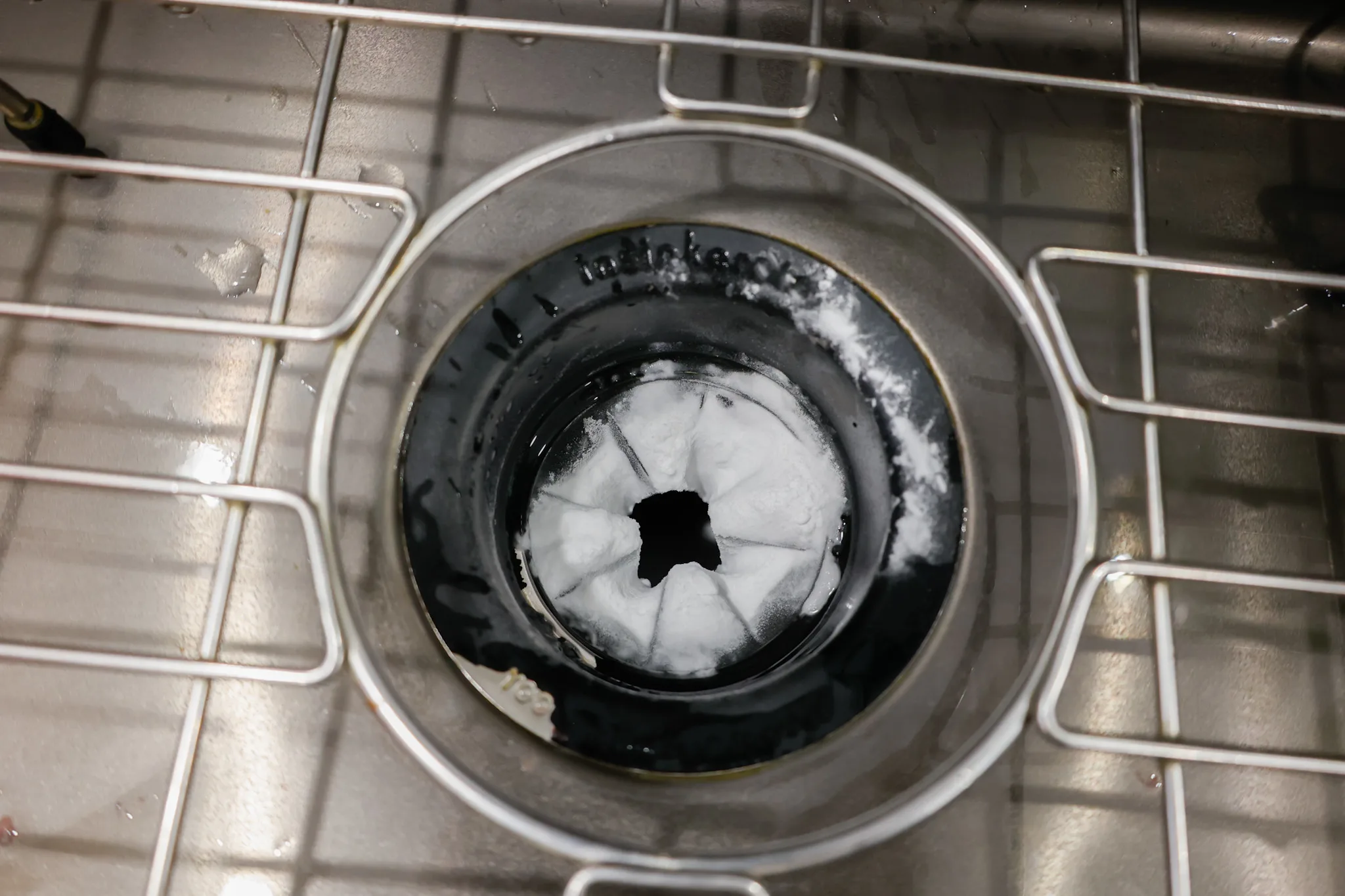 baking soda sprinkled into garbage disposal