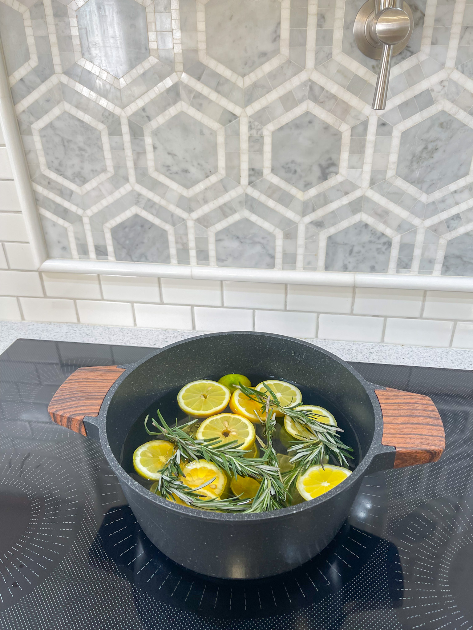 side view of stovetop potpourri on cooktop