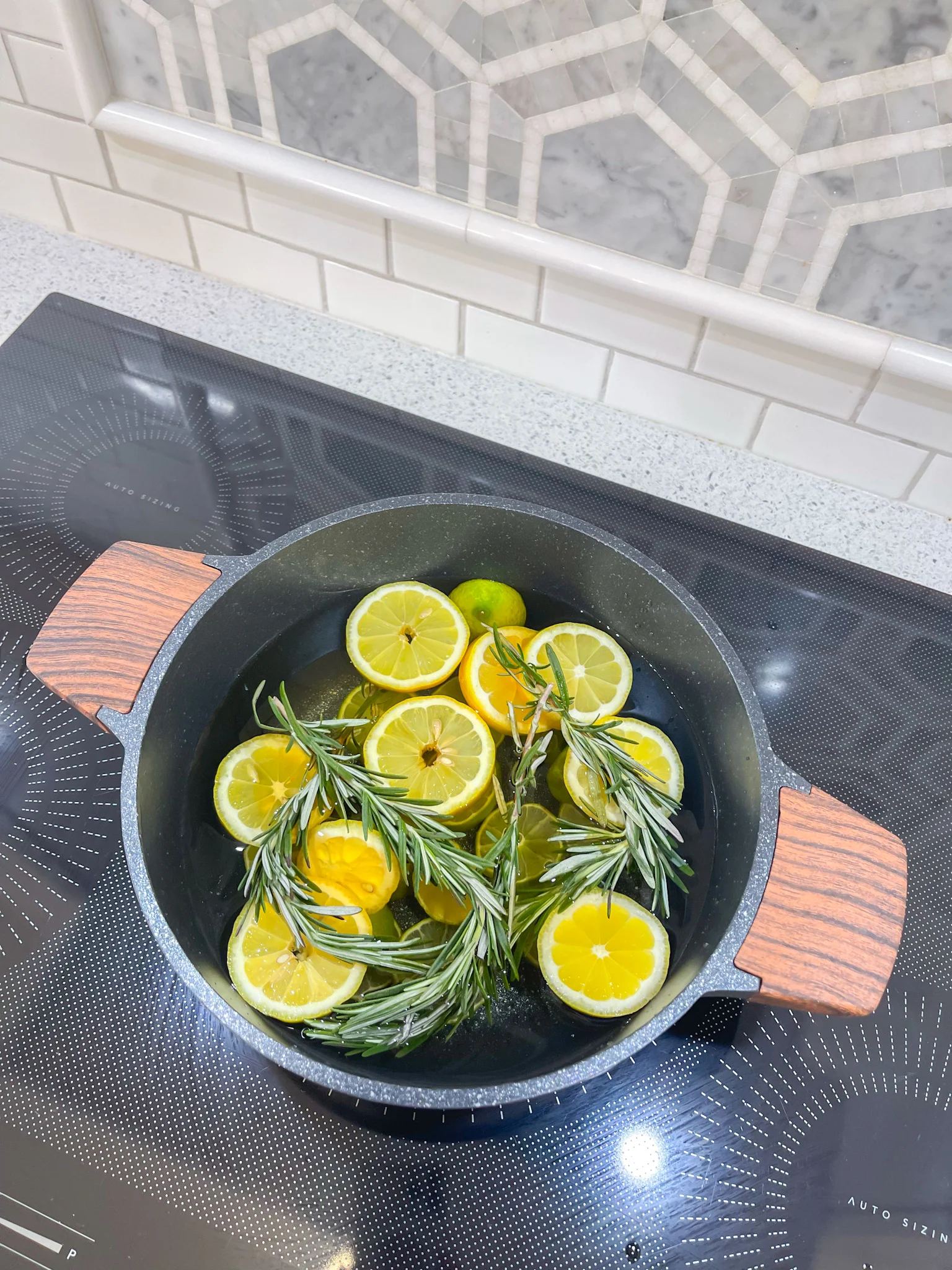 top view of pot filled with stovetop potpourri ingredients