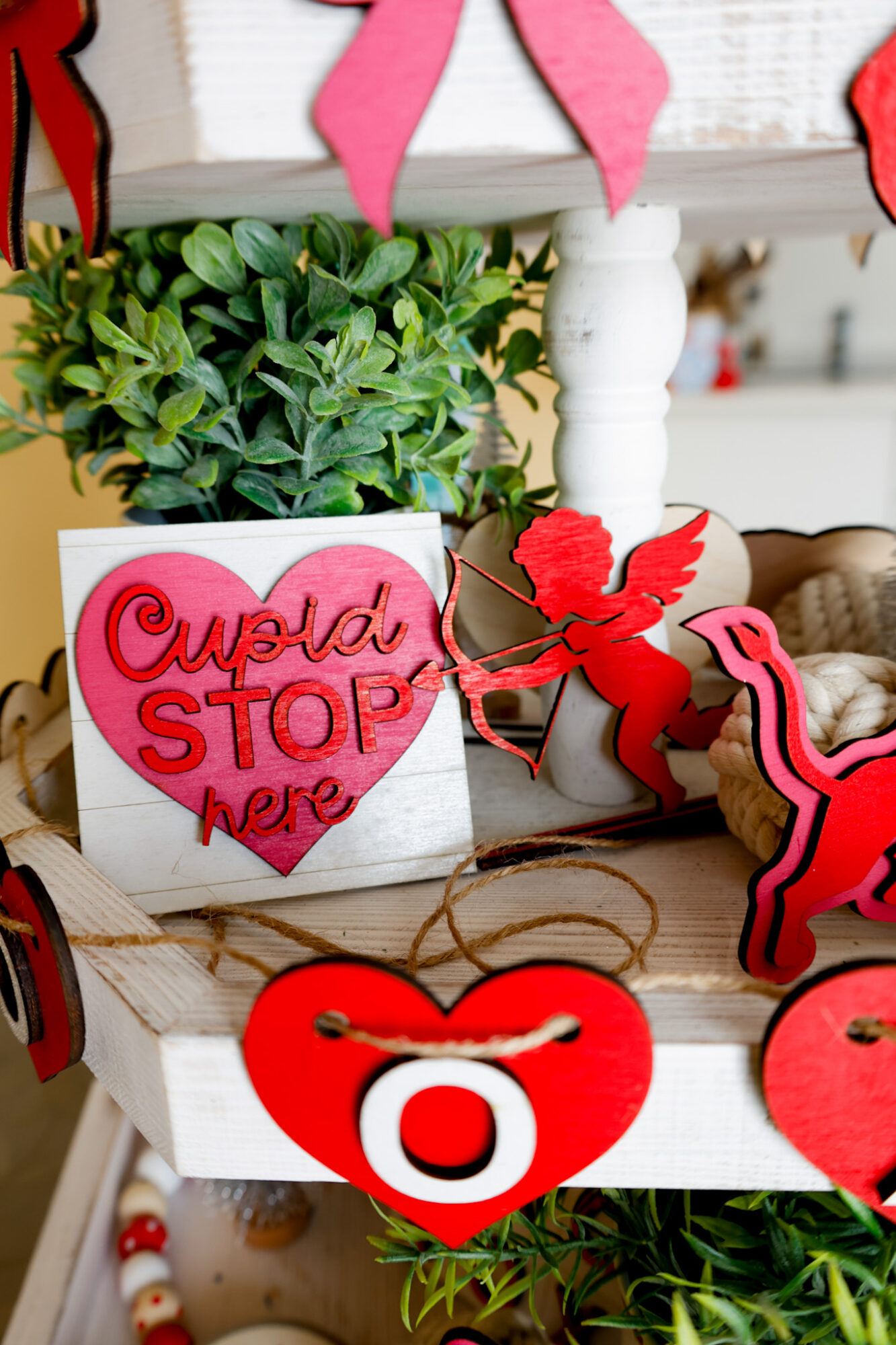 cupid stop here sign finished cut in tiered tray